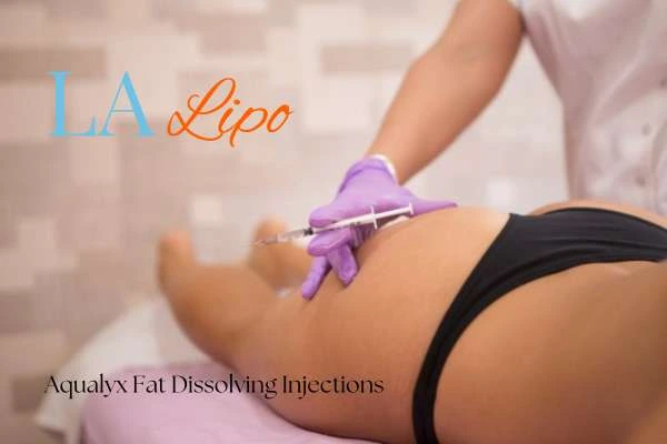 Woman having fat dissolving injections Lower Feltham on thighs